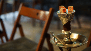 Premium shisha at Eden Lounge in Scarborough, Toronto—cozy fall night with plush seating and ambient lighting